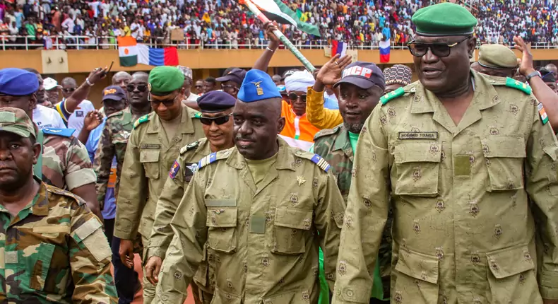 Niger reopens airspace for flights post-coup.