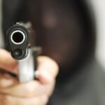 pistol-gunmen-shot-gun