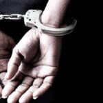 HANDCUFFED-FELLOW