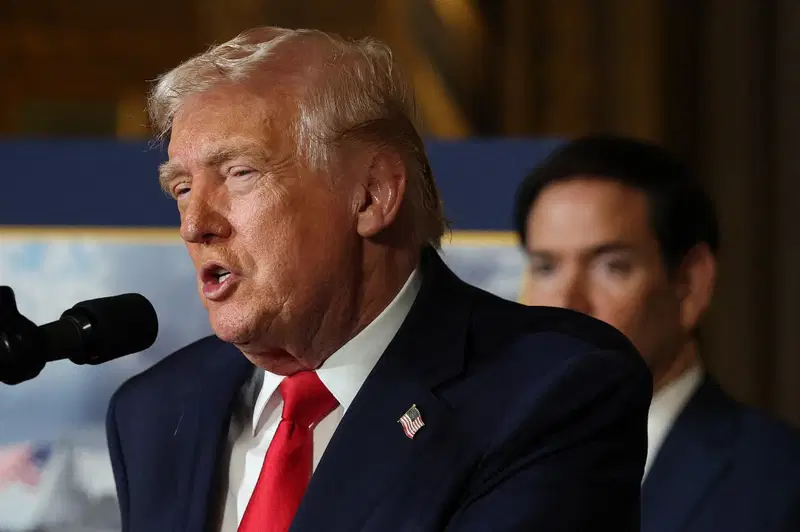 AFP__20251222__2253191423__v2__MidRes__PresidentTrumpWithSecretariesOfNavyAndWarMake